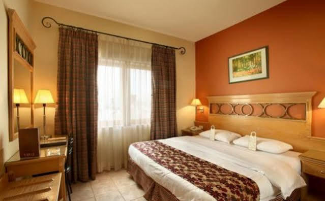Capri Hotel Suites Амман Экстерьер фото